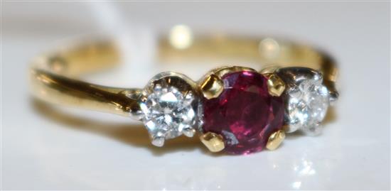 Gold, diamond and ruby 3 stone ring